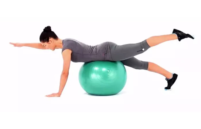 Swiss ball arm and leg lift for the back