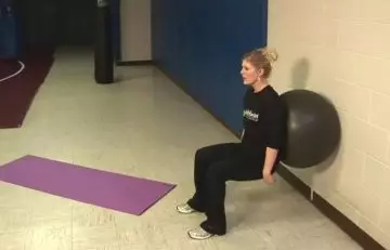 Swiss ball wall squat for the back