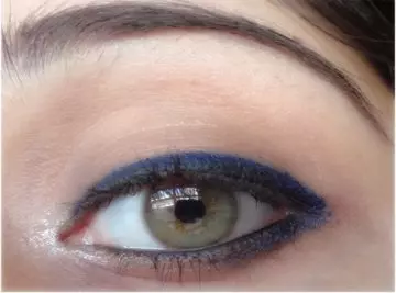 Step 8 of applying blue eyeliner