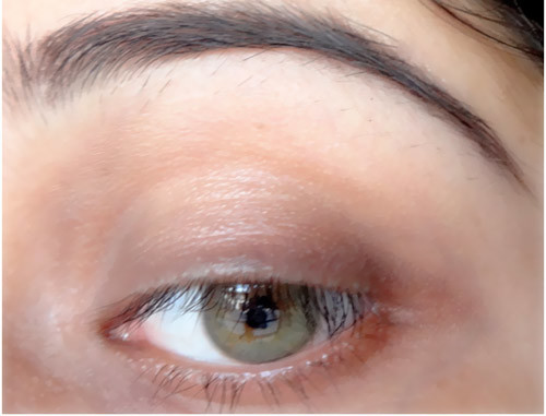 Step 1 of applying blue eyeliner