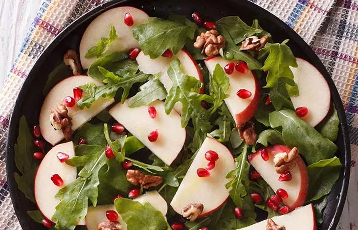 Apple and pomegranate salad with spicy honey dressing