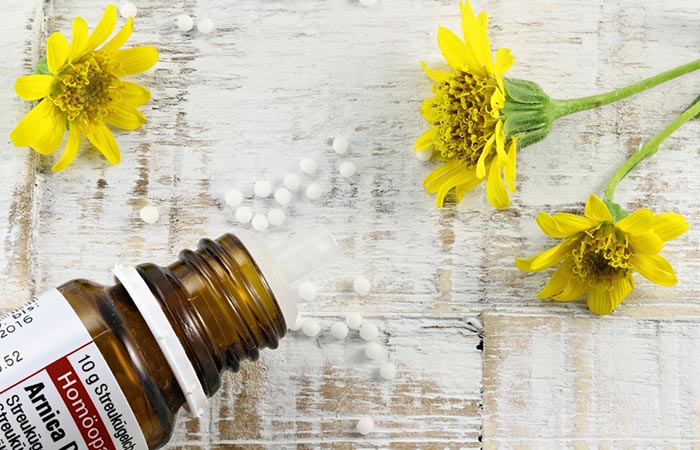 Arnica homeopathic pills on the table