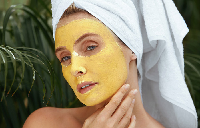 Woman with mango face mask for sensitive skin