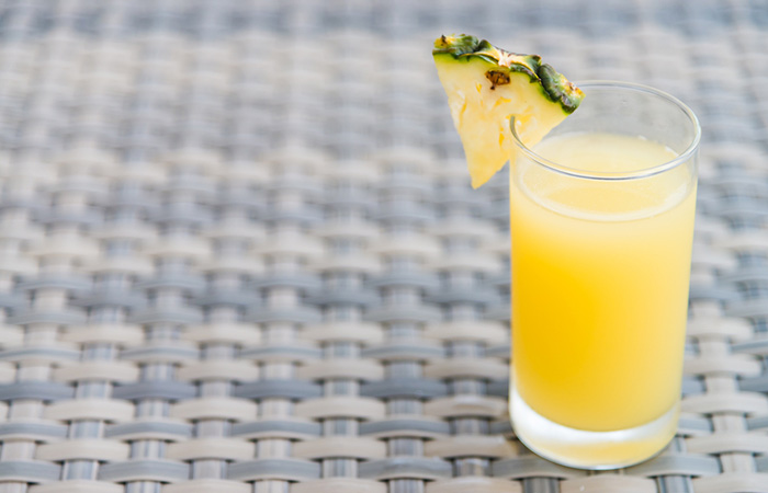 A glass of freshly blended pineapple juice to manage edema