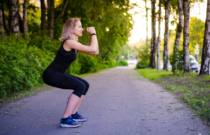 Woman doing air squats