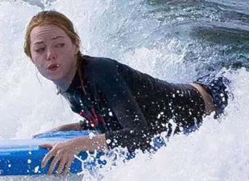 Emma Stone surfing her way