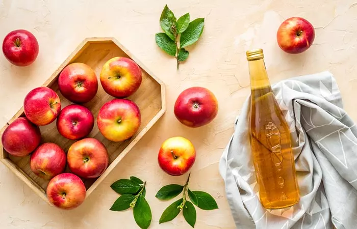 A bottle of apple cider vinegar for bald patches