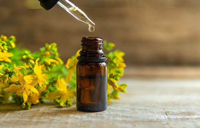 A vial of St.John's wort oil with dropper