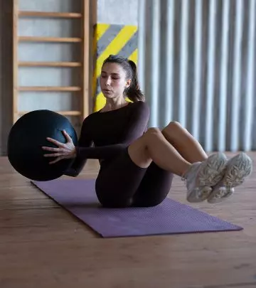 Woman performing core strengthening exercise