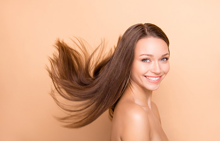 Woman flaunting healthy and thick hair