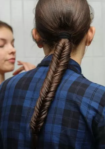 High fishtail braid with hair wrap workout hairstyle