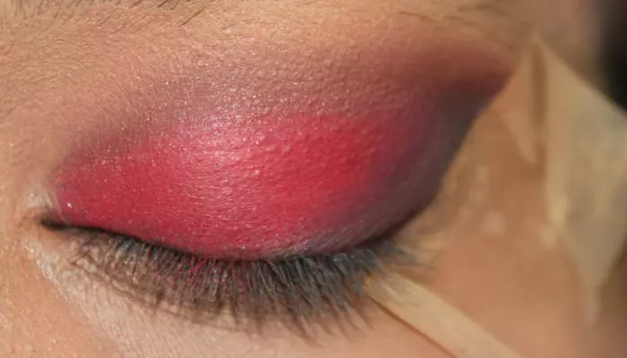 Step 5 of red and black eye makeup