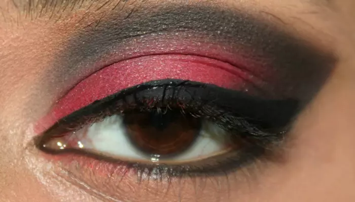 Step 7 of red and black eye makeup