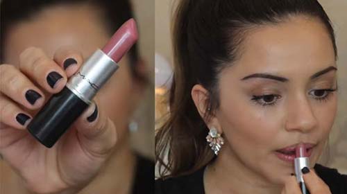 Apply lipstick to define your pout for a natural makeup look