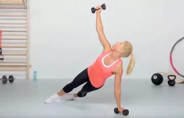 Dumbbell plank rotation chest exercise for women