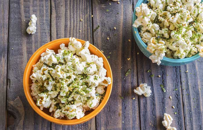 Air popped cilantro lime popcornis among the best oil-free snacks