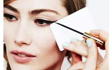 Create winged eyeliner with a swipe card