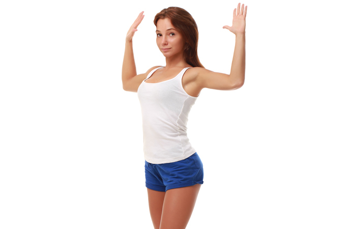 Standing chest stretch exercise for women
