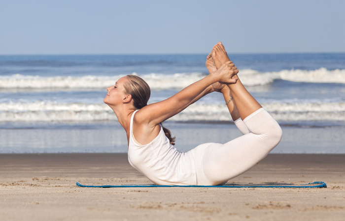 Dhanurasana yoga pose to alleviate anxiety