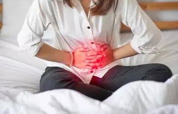 Woman suffering with Irritable bowel syndrome