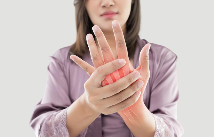 Woman suffering with rheumatoid arthritis an autoimmune disorder