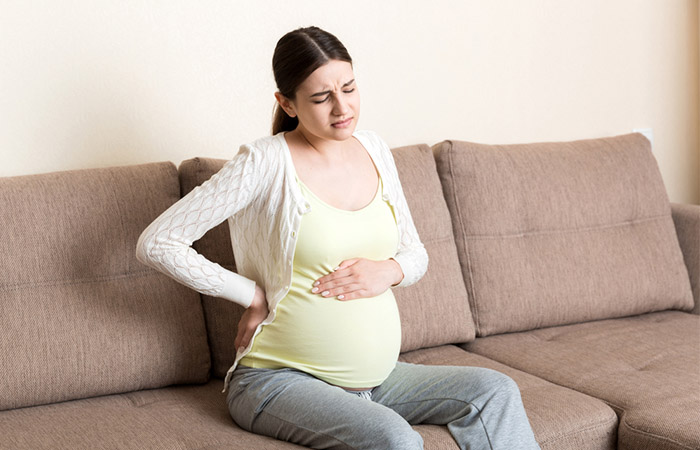 A pregnant woman suffering from pain