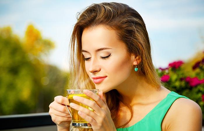 Girl enjoying a cup of ginseng tea