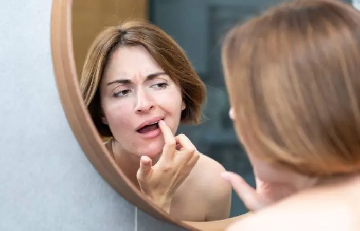 Woman checking her ulcer