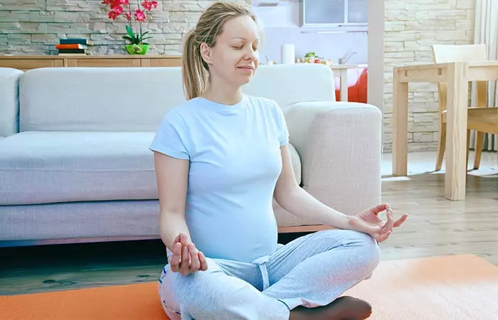 Relieve stress by practicing meditation to reduce belly fat after pregnancy