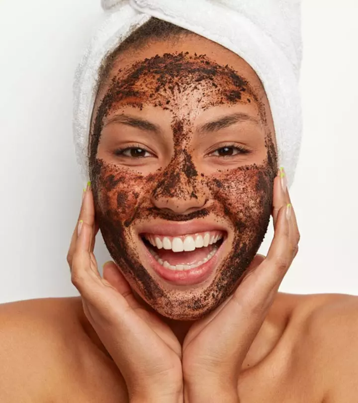 A girl applied a coffee face mask on her body