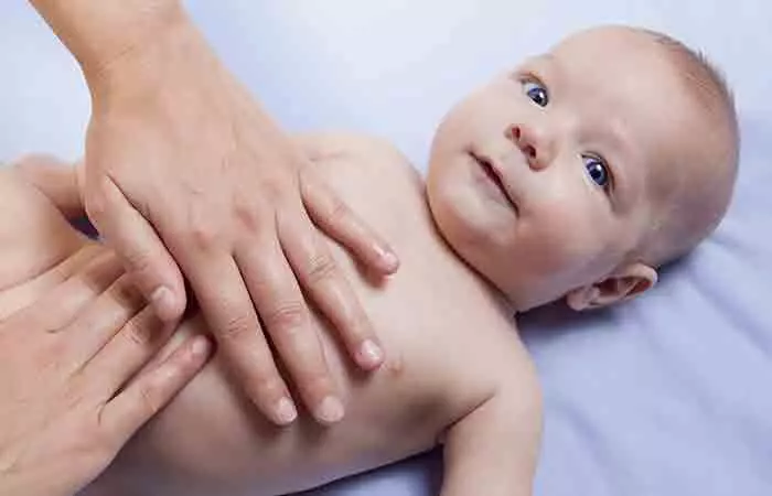 Baby getting a gentle massage from an adult