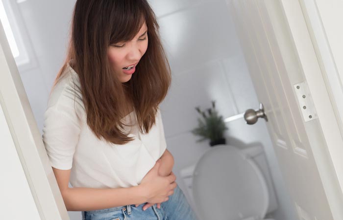 Woman suffering from stomach problem for consuming mushroom
