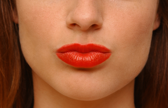 Vivid orange lipstick shade