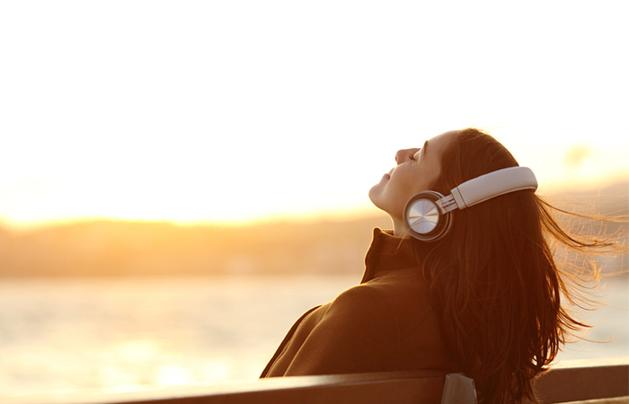 Woman enjoying her company with music