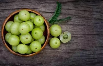 Overhead shot of a bowl filled with amla.