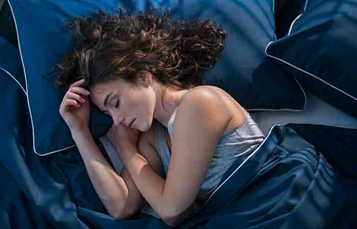 Woman sleeping soundly after flute meditation