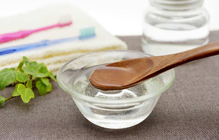 Oil pulling with coconut oil for cavities