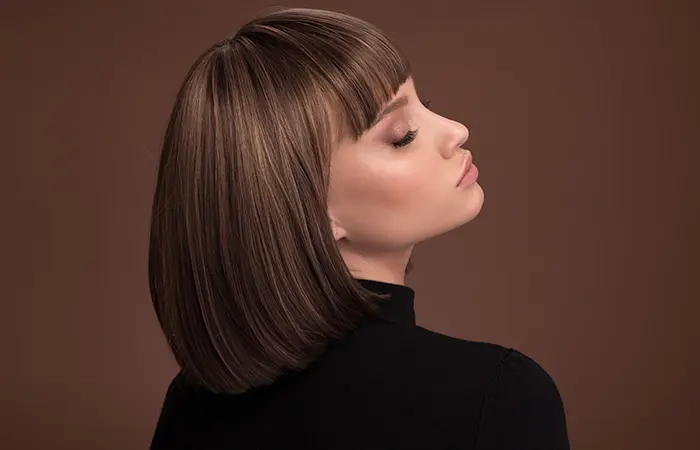 A woman with short bob hair