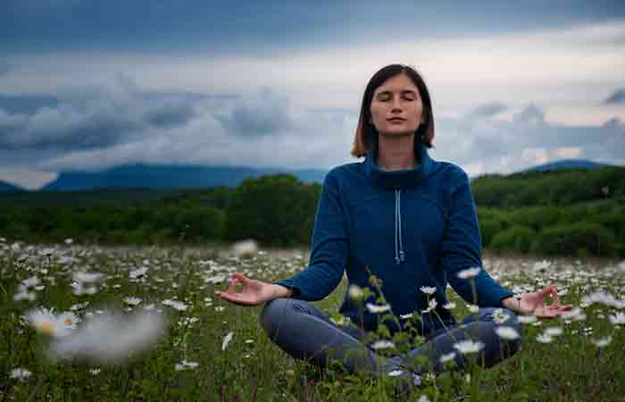Woman practicing deep meditation