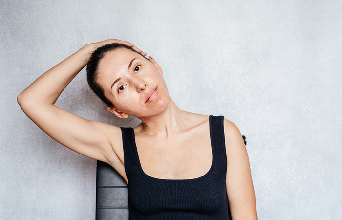 Woman doing neck exercise