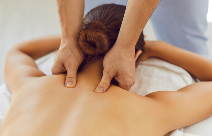 Woman undergoing massage therapy