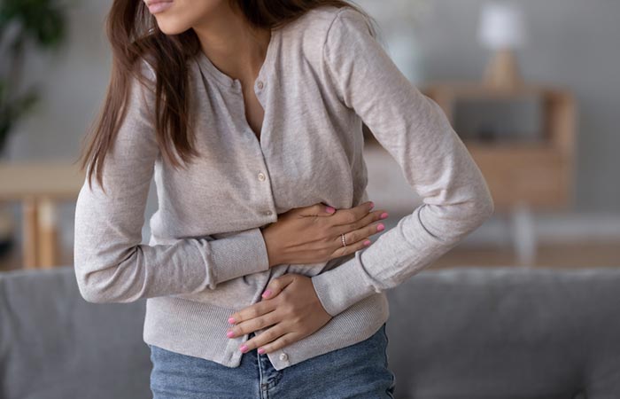 Woman experiences gastric distress as a side effect of using oregano oil
