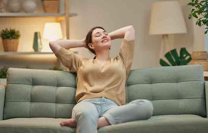 Woman feeling relaxed after flute meditation