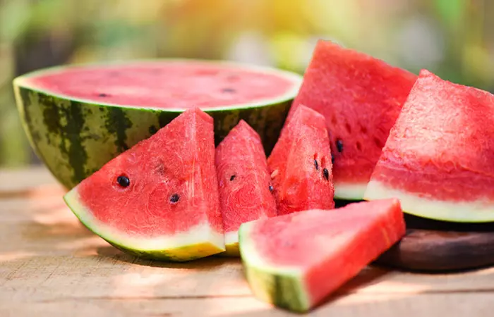 Sliced watermelon on wooden table