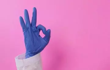 Wear disposable gloves while coloring eyebrow for white hair