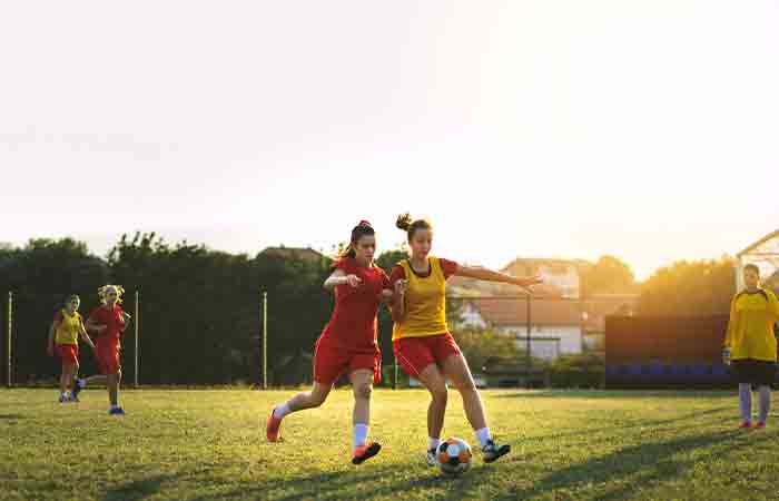 Teen girls play soccer to stay active and for weight loss