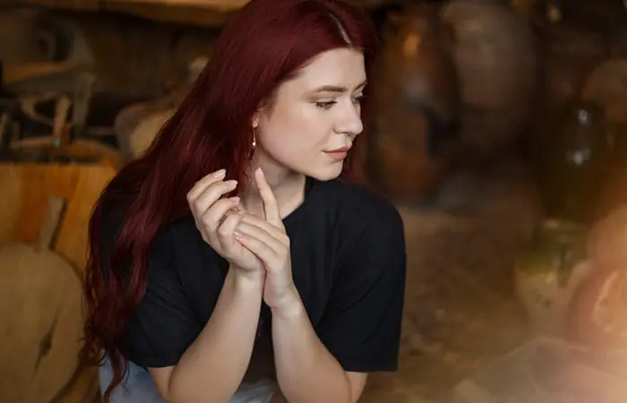 Woman in brown burgundy hair color