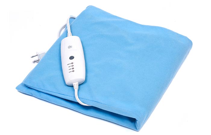 Castor oil and heating pad for constipation