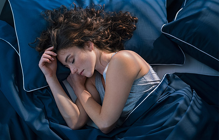 Woman sleeping for weight loss and rejuvenation