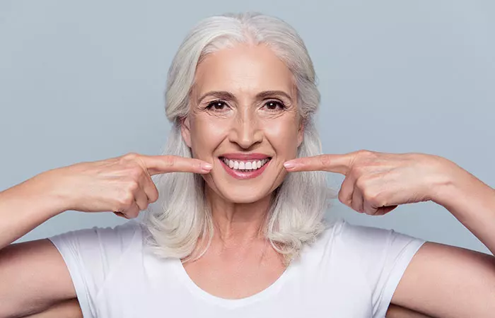 Woman with healthy teeth after using neem